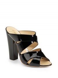 THE LOOKCross-over strapsOpen backTHE FITSelf-covered heel, 5½ (140mm)THE MATERIALPatent leather upperLeather lining and soleORIGINMade in Italy THE LOOKCross-over strapsOpen backTHE FITSelf-covered heel, 5½ (140mm)THE MATERIALPatent leather upperLeather lining and soleORIGINMade in Italy