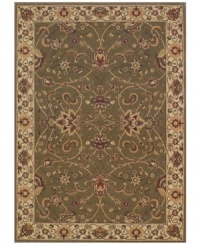 Evoking the strong look of ancient Sarouk rug designs, the Premier area rug from Dalyn is woven with intricate floral medallions in soft sage. Made in Egypt of durable polypropylene and shimmering polyester fibers, it provides any room with captivating texture and added dimension.