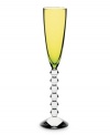 Color it chic. Baccarat takes already-stunning Vega stemware to the next level with this olive-tinted flute. A chunky, beaded stem contrasts brilliant color in heavy, exquisitely crafted crystal.