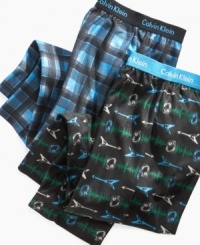 Lounge around. He'll love the comfy feel of the elastic waist and soft polyester of these sleep pants from Calvin Klein. Lounge around. He'll love the comfy feel of the elastic waist and soft polyester of these sleep pants from Calvin Klein.