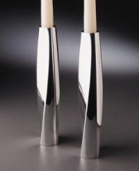 The Twist candlestick pair designed, by Fred Bould for Nambé will lend your home modern elegance. The appearance of movement and striking silhouette is achieved by the indented, curved shape on high-polished metal. The Twist candlestick pair designed, by Fred Bould for Nambé will lend your home modern elegance. The appearance of movement and striking silhouette is achieved by the indented, curved shape on high-polished metal.