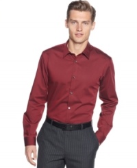 Wear this shirt from your cubicle straight to a dinner party. This long sleeve tonal stripe shirt by Calvin Klein is a must have. Wear this shirt from your cubicle straight to a dinner party. This long sleeve tonal stripe shirt by Calvin Klein is a must have.