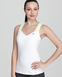 This sleek tank from Nike, boasting neon trim, keeps you looking (and feeling) cool inside the gym and out. This sleek tank from Nike, boasting neon trim, keeps you looking (and feeling) cool inside the gym and out.