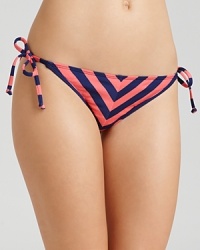 Bump, set, spike! This seventies-inspired bikini from Ella Moss features graphic sporty stripes perfectly suited for a game of beach volleyball. Bump, set, spike! This seventies-inspired bikini from Ella Moss features graphic sporty stripes perfectly suited for a game of beach volleyball.