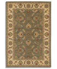 Covered in graceful floral imagery, this area rug will fill your room with color. The Sedona Henna rug is woven from New Zealand worsted wool that has been specially twisted and space-dyed to replicate the look of a hand-woven Peshawar rug. In limestone green with accents of red and beige, this magnificent piece creates an inviting space for gatherings in your home. Covered in graceful floral imagery, this area rug will fill your room with color. The Sedona Henna rug is woven from New Zealand worsted wool that has been specially twisted and space-dyed to replicate the look of a hand-woven Peshawar rug. In limestone green with accents of red and beige, this magnificent piece creates an inviting space for gatherings in your home.