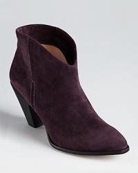 A western-inspired bootie silhouette from Belle by Sigerson Morrison slips on with a flowing skirt for bohemian chic. A western-inspired bootie silhouette from Belle by Sigerson Morrison slips on with a flowing skirt for bohemian chic.