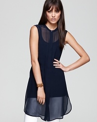 Known for go-to, city-chic pieces, this Vince tunic is no exception to the rule. Luxe silk pairs with tights or leggings for minimalist-cool. Known for go-to, city-chic pieces, this Vince tunic is no exception to the rule. Luxe silk pairs with tights or leggings for minimalist-cool.