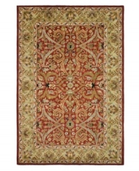 A luxurious arrangement of swirling florals gives this Safavieh area rug a decidedly classical appeal. Tufted in India from pure wool, this rug boasts a background of deep red and a supporting palette of color that creates a beautiful contrast of light and dark. (Clearance) A luxurious arrangement of swirling florals gives this Safavieh area rug a decidedly classical appeal. Tufted in India from pure wool, this rug boasts a background of deep red and a supporting palette of color that creates a beautiful contrast of light and dark. (Clearance)
