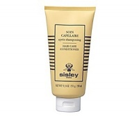 Hair is visibly shinier, softer and fuller. A formula that protects and coats the hair shaft to improve the quality of the hair. Rich in Phytoceramides of Rice, Shea Butter, Wheat Proteins and D-Panthénol, Sisley's Soin Capillaire is a beautifying balm formulated to answer the needs of damaged and devitalised hair.- It supplies nutrients to protect the harmful effects of external stress factors. - It coats the hair shaft to visibly improve the quality of the hair. - Hair is shinier, softer, fuller. Hair is visibly shinier, softer and fuller. A formula that protects and coats the hair shaft to improve the quality of the hair. Rich in Phytoceramides of Rice, Shea Butter, Wheat Proteins and D-Panthénol, Sisley's Soin Capillaire is a beautifying balm formulated to answer the needs of damaged and devitalised hair.- It supplies nutrients to protect the harmful effects of external stress factors. - It coats the hair shaft to visibly improve the quality of the hair. - Hair is shinier, softer, fuller.