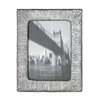 Donna Karan infuses her modern, city-chic aesthetic into this unique frame from Lenox, wrapped in a gleaming thread-like texture. Donna Karan infuses her modern, city-chic aesthetic into this unique frame from Lenox, wrapped in a gleaming thread-like texture.