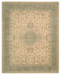 Premium-quality New Zealand wool yarns are specially dyed to create the vintage look of this traditional area rug. Emulating the look of vegetable dying, the Heritage Hall rug features a characteristically delicate color palette that brings a regal aura to any room. Premium-quality New Zealand wool yarns are specially dyed to create the vintage look of this traditional area rug. Emulating the look of vegetable dying, the Heritage Hall rug features a characteristically delicate color palette that brings a regal aura to any room.