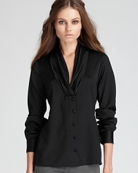 A tonal, reptilian texture lends an exotic look to a forward top from Rachel Zoe. A shawl neckline and blousy sleeves complete the look. A tonal, reptilian texture lends an exotic look to a forward top from Rachel Zoe. A shawl neckline and blousy sleeves complete the look.