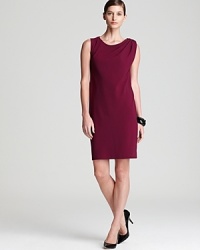 With impeccable tailoring and a jewel tone palette, this DNKY dress stops traffic from commute to corner office. With impeccable tailoring and a jewel tone palette, this DNKY dress stops traffic from commute to corner office.