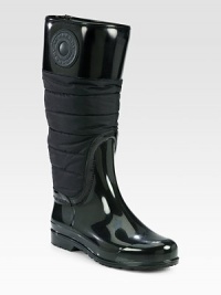 A quilted nylon shaft modernizes this weather essential of durable rubber with leather paneling. Rubber heel, 1 (25mm)Shaft, 14Leg circumference, 15Rubber, nylon and leather upperPull-on styleJersey liningRubber solePadded insoleMade in Italy A quilted nylon shaft modernizes this weather essential of durable rubber with leather paneling. Rubber heel, 1 (25mm)Shaft, 14Leg circumference, 15Rubber, nylon and leather upperPull-on styleJersey liningRubber solePadded insoleMade in Italy