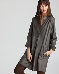 Fashioned in luxurious leather, this Vince dress exudes cutting-edge modernity for downtown cool. Fashioned in luxurious leather, this Vince dress exudes cutting-edge modernity for downtown cool.