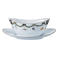 With its elegant depictions of pine garlands, red ribbons and traditional Christmas ornaments, Royal Copenhagen's fine bone-china serveware is the perfect backdrop to a joyous holiday celebration. A well-loved classic, the Star Fluted design was first produced in 1895. With its elegant depictions of pine garlands, red ribbons and traditional Christmas ornaments, Royal Copenhagen's fine bone-china serveware is the perfect backdrop to a joyous holiday celebration. A well-loved classic, the Star Fluted design was first produced in 1895.