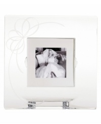 The luminous, ribbon-like motif of the Belle Boulevard collection nestles at the corner of this picture frame. Timeless and elegant, it's the perfect way to memorialize your finest moments. The luminous, ribbon-like motif of the Belle Boulevard collection nestles at the corner of this picture frame. Timeless and elegant, it's the perfect way to memorialize your finest moments.