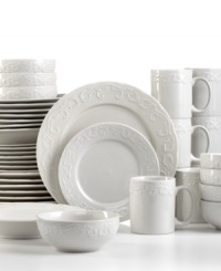 A scrolling, traditional design wraps around each rim of the Charlotte dinnerware set, offering a long-standing, elegant pattern for any table. From Pfaltzgraff.