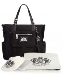 Oh, baby--have we got a bag for you. This mother's little helper from Juicy Couture is the best thing since disposable diapers. Features ultra-light nylon, super-organized interior with multiple compartments and complimentary terry bib, wipes holder and changing table. Oh, baby--have we got a bag for you. This mother's little helper from Juicy Couture is the best thing since disposable diapers. Features ultra-light nylon, super-organized interior with multiple compartments and complimentary terry bib, wipes holder and changing table.