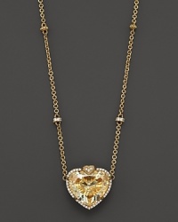 A heart-shaped canary crystal pendant framed by diamond pave accents drops from an 18K gold chain with decorative diamond stations. By Judith Ripka. A heart-shaped canary crystal pendant framed by diamond pave accents drops from an 18K gold chain with decorative diamond stations. By Judith Ripka.
