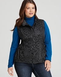 Equal parts glamorous and exotic, this Tahari Woman leopard-print vest layers your vibrant seasonal styles with fierce, feminine flair. Equal parts glamorous and exotic, this Tahari Woman leopard-print vest layers your vibrant seasonal styles with fierce, feminine flair.