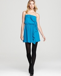 Get the party started in this chic strapless dress with stylish pleats and cascading ruffles down the front. Get the party started in this chic strapless dress with stylish pleats and cascading ruffles down the front.
