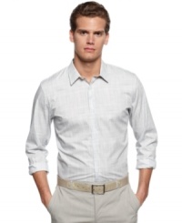 Classic style with a modern twist. This woven shirt from Calvin Klein comes in a slim fit for your up-to-date look. Classic style with a modern twist. This woven shirt from Calvin Klein comes in a slim fit for your up-to-date look.