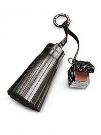 An elegant Burberry Beauty purse charm featuring a single check-engraved cube attached to a luxurious faux-leather tassel. The charm opens to reveal a natural cameo pink lip gloss to add a hint of colour for a fresh and moisturized glow. 