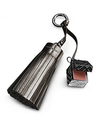 An elegant Burberry Beauty purse charm featuring a single check-engraved cube attached to a luxurious faux-leather tassel. The charm opens to reveal a natural cameo pink lip gloss to add a hint of colour for a fresh and moisturized glow. An elegant Burberry Beauty purse charm featuring a single check-engraved cube attached to a luxurious faux-leather tassel. The charm opens to reveal a natural cameo pink lip gloss to add a hint of colour for a fresh and moisturized glow.