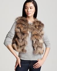 Indulge yourself in the ultra-luxe warmth of this chic fur Theory vest. Indulge yourself in the ultra-luxe warmth of this chic fur Theory vest.