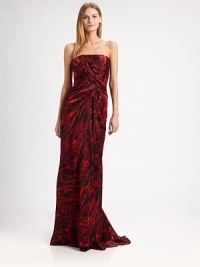 This strapless silk print has a softly twisted front and comes with coordinating stole.Twisted frontFlounce hemConcealed back zipSheer stole with coordinating borderFully linedAbout 42 from natural waistSilkDry cleanImported of Italian fabricModel shown is 5'10 (177cm) wearing US size 4. This strapless silk print has a softly twisted front and comes with coordinating stole.Twisted frontFlounce hemConcealed back zipSheer stole with coordinating borderFully linedAbout 42 from natural waistSilkDry cleanImported of Italian fabricModel shown is 5'10 (177cm) wearing US size 4.