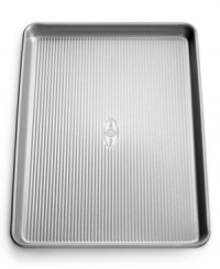 Proud to be American made! The commercial-grade heavy-gauge aluminized steel pan features a unique fluted surface that promotes even air circulation while baking, so your sweet treats are always perfectly delicious. A nonstick, environmentally-friendly silicone finish is safe, natural and simply the best for baking. Lifetime warranty. Proud to be American made! The commercial-grade heavy-gauge aluminized steel pan features a unique fluted surface that promotes even air circulation while baking, so your sweet treats are always perfectly delicious. A nonstick, environmentally-friendly silicone finish is safe, natural and simply the best for baking. Lifetime warranty.