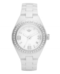Perfectly on time, with just a bit of flair. Mini Cambridge watch by adidas crafted of white polyurethane strap and round nylon plastic case. Silver tone bezel embellished with crystal accents. White dial features numerals at three, six and nine o'clock, stick indices, minute track, date window at four o'clock, three hands and logo at twelve o'clock. Perfectly on time, with just a bit of flair. Mini Cambridge watch by adidas crafted of white polyurethane strap and round nylon plastic case. Silver tone bezel embellished with crystal accents. White dial features numerals at three, six and nine o'clock, stick indices, minute track, date window at four o'clock, three hands and logo at twelve o'clock.
