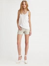 Lightweight cotton layering piece with an oversized patch pocket and a ruffled hem. Rounded v-neckSleevelessFront patch pocketTiered hemLonger length hits below the hipsCottonHand washImportedModel shown is 5'9½ (176cm) wearing US size Small. Lightweight cotton layering piece with an oversized patch pocket and a ruffled hem. Rounded v-neckSleevelessFront patch pocketTiered hemLonger length hits below the hipsCottonHand washImportedModel shown is 5'9½ (176cm) wearing US size Small.