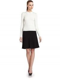 THE LOOKPolo collarLong sleeves with ribbed cuffsRibbed hemBack zipper with hook-and-eye closureTHE FITAbout 21 from shoulder to hemTHE MATERIAL83% viscose/17% polyesterCARE & ORIGINHand wash or dry cleanMade in ItalyModel shown is 5'10½ (179cm) wearing US size 2. THE LOOKPolo collarLong sleeves with ribbed cuffsRibbed hemBack zipper with hook-and-eye closureTHE FITAbout 21 from shoulder to hemTHE MATERIAL83% viscose/17% polyesterCARE & ORIGINHand wash or dry cleanMade in ItalyModel shown is 5'10½ (179cm) wearing US size 2.