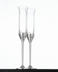 Celebrate your memorable moments with the Love Knots toasting flutes. Only Vera Wang could capture elegance so gracefully and tie it up with a bow. Set of 2. Celebrate your memorable moments with the Love Knots toasting flutes. Only Vera Wang could capture elegance so gracefully and tie it up with a bow. Set of 2.