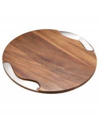 Nambe sculpts rich acacia hardwood into the ideal cheese cutting board, carved with precise storage nooks for the knife and spreader. Minimalist stainless steel utensils with lasting gleam stay put magnetically when they're not busy slicing and serving. This collection of cheese boards is designed by Neil Cohen. Nambe sculpts rich acacia hardwood into the ideal cheese cutting board, carved with precise storage nooks for the knife and spreader. Minimalist stainless steel utensils with lasting gleam stay put magnetically when they're not busy slicing and serving. This collection of cheese boards is designed by Neil Cohen.