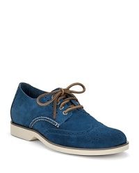 Every man needs to make room in his closet for a pair of blue suede shoes. These wingtips from Sperry Top-Sider embody the casual-cool that has made Sperry a favorite for years, but are sophisticated enough to wear to the office. Every man needs to make room in his closet for a pair of blue suede shoes. These wingtips from Sperry Top-Sider embody the casual-cool that has made Sperry a favorite for years, but are sophisticated enough to wear to the office.