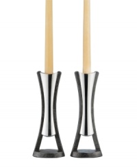 See Nambe's signature metal in a whole new light with the beautiful contours of Anvil candlesticks. A rustic, iron-finished base balances lustrous silvertone alloy in Neil Cohen's ultra-modern design. See Nambe's signature metal in a whole new light with the beautiful contours of Anvil candlesticks. A rustic, iron-finished base balances lustrous silvertone alloy in Neil Cohen's ultra-modern design.
