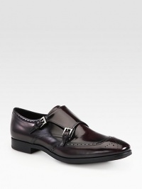 Fine Italian leather with monkstrap and perforated detail. Leather upperLeather liningRubber solePadded insoleMade in Italy Fine Italian leather with monkstrap and perforated detail. Leather upperLeather liningRubber solePadded insoleMade in Italy