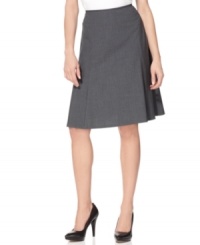 Calvin Klein's sleek A-line skirt always makes the right impression. Pair it with a fitted jacket and a silk blouse to complete the look. Calvin Klein's sleek A-line skirt always makes the right impression. Pair it with a fitted jacket and a silk blouse to complete the look.