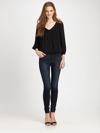 Versatile silk go-to with delicate pleats and bishop sleeves.Pleated V-neckBracelet sleevesPullover styleAbout 26 from shoulder to hemSilk/SpandexDry cleanImportedModel shown is 5'10 (177cm) wearing US size 4. Versatile silk go-to with delicate pleats and bishop sleeves.Pleated V-neckBracelet sleevesPullover styleAbout 26 from shoulder to hemSilk/SpandexDry cleanImportedModel shown is 5'10 (177cm) wearing US size 4.