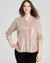In allover clear sequins, Calvin Klein Plus' blush-hued blouse lends a soft, feminine look with subtle sparkle. In allover clear sequins, Calvin Klein Plus' blush-hued blouse lends a soft, feminine look with subtle sparkle.