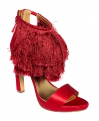 Fringe-tastic and fun. Nine West's Holleratme platform sandals have so much fringe detail around the ankle that you won't be able to sit still for a moment. Fringe-tastic and fun. Nine West's Holleratme platform sandals have so much fringe detail around the ankle that you won't be able to sit still for a moment.
