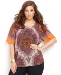 An exotic print lets bold hues stand out! INC's plus size top can be styled casually or dressed up depending on your mood. An exotic print lets bold hues stand out! INC's plus size top can be styled casually or dressed up depending on your mood.
