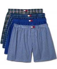 That essential element of preppie dressing, the all-cotton boxer short, offered here by Tommy Hilfiger in a four-pack wardrobe of blue-accented wovens. That essential element of preppie dressing, the all-cotton boxer short, offered here by Tommy Hilfiger in a four-pack wardrobe of blue-accented wovens.