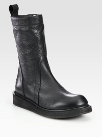 Pebbled leather, mid-calf style with a side zipper, rubber sole and extended pull tab. Rubber wedge, 1 (25mm)Rubber platform, ½ (15mm)Compares to a ½ heel (15mm)Shaft, 10Leg circumference, 12Leather upperSide zipperLeather liningRubber solePadded insoleMade in Italy Pebbled leather, mid-calf style with a side zipper, rubber sole and extended pull tab. Rubber wedge, 1 (25mm)Rubber platform, ½ (15mm)Compares to a ½ heel (15mm)Shaft, 10Leg circumference, 12Leather upperSide zipperLeather liningRubber solePadded insoleMade in Italy