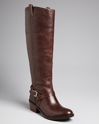 These lanky equestrian boosts are embellished with elegant harnesses for a look of put-together ease; by IVANKA TRUMP. These lanky equestrian boosts are embellished with elegant harnesses for a look of put-together ease; by IVANKA TRUMP.
