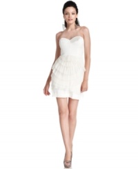 Beautiful for any occasion (but especially striking for bridal celebrations), BCBGMAXAZRIA's sweetheart-neck dress features a skirt full of scalloped tiers for a modernly feminine look. Beautiful for any occasion (but especially striking for bridal celebrations), BCBGMAXAZRIA's sweetheart-neck dress features a skirt full of scalloped tiers for a modernly feminine look.