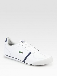 Preppy and polished meets sporty in these leather kicks with perforated detail and signature embroidered croc logo on side panel.Leather upperLeather liningPadded insoleRubber soleImported Preppy and polished meets sporty in these leather kicks with perforated detail and signature embroidered croc logo on side panel.Leather upperLeather liningPadded insoleRubber soleImported